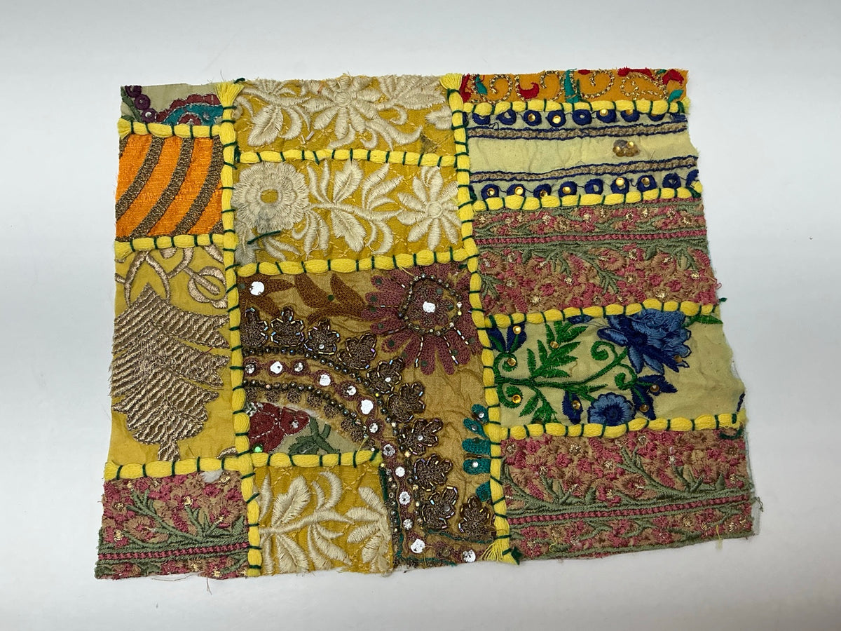 Golden boho patchwork textile panel with florals beads and embroidery