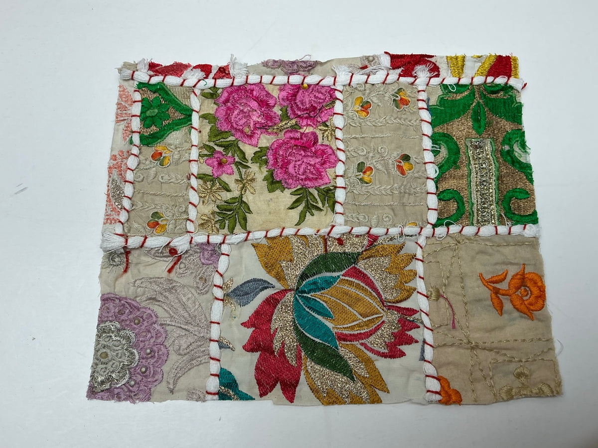 Ivory patchwork textile panel with pink roses and multicolor embroidery