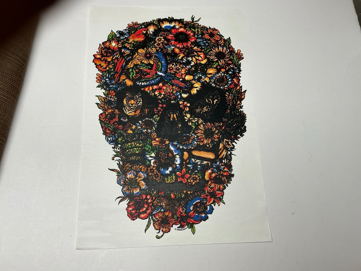 Dark floral skull statement embellishment with multicolor flowers