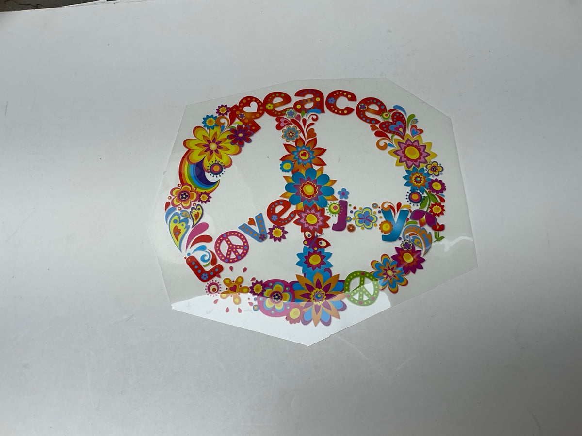 Colorful flower power peace sign with peace love and joy lettering