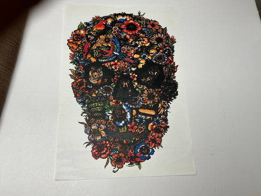 Dark floral skull statement embellishment with multicolor flowers